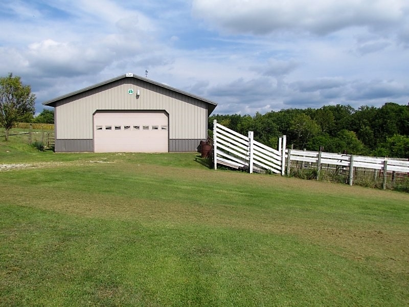 24.34 Acres Including Country Home & Outbuildings
