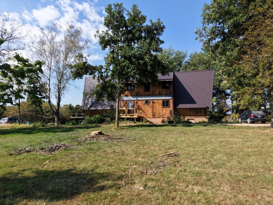 28383 Lodge Style Home & 25 Acres